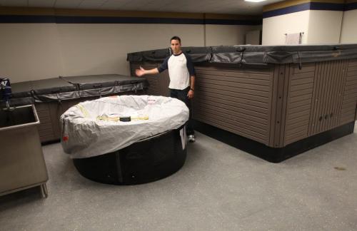 Winnipeg Blue Bombers head Athletic Therapist Alain Couture shows new tubs in athletic therapy rooms in new stadium -  The Free Press was given a tour in Investors Group Field that is under construction- The new stadium will be home to the Winnipeg Blue Bombers for the 2013 season-See Paul Wiecek story- March 08, 2013   (JOE BRYKSA / WINNIPEG FREE PRESS)