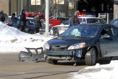 Mvc involving 2 cars at the corner of Broadway and Carlton. One minor injury for sure. Police on scene.. March 20, 2013  BORIS MINKEVICH / WINNIPEG FREE PRESS