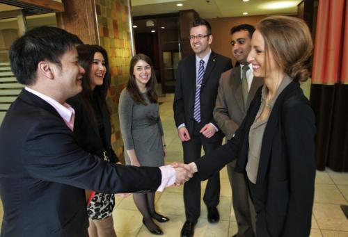(L-r) Sutthiporn Mekha-Aphirak and Salilla Kulwirottama from the Sasin Graduate Institute of Business Administration of Chulalongkorn University in Bangkok, Thailand meet Alix Billinkoff, James Fehr, Manish Kaushal, and Hayley Johnston who are University of Manitoba business students taking part in the Stu Clark Investment Competition being held at the Faimont Hotel. The competition has brought students from around the globe and the winner earns a berth in the prestigious Venture Labs Investment Competition held at the University of Texas. The U of Manitoba team, Prairie Food Innovation, has developed a gluten free pizza crust while the team from Thailand is called LeLux and manufactures silver jewelry.  130321 March 21, 2013 Mike Deal / Winnipeg Free Press