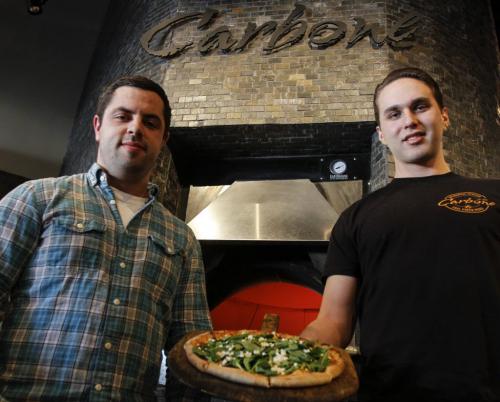 Carbone Coal-Fired Pizza co-owner-operators Daniel Simon and Benjamin Nasberg (left to right) anticipate opening a second Winnipeg location this coming September. The new location is at 260 St. Mary Ave. downtown. March 21, 2013. (REPORTER: MURRAY MCNEILL) (JESSICA BURTNICK/WINNIPEG FREE PRESS)