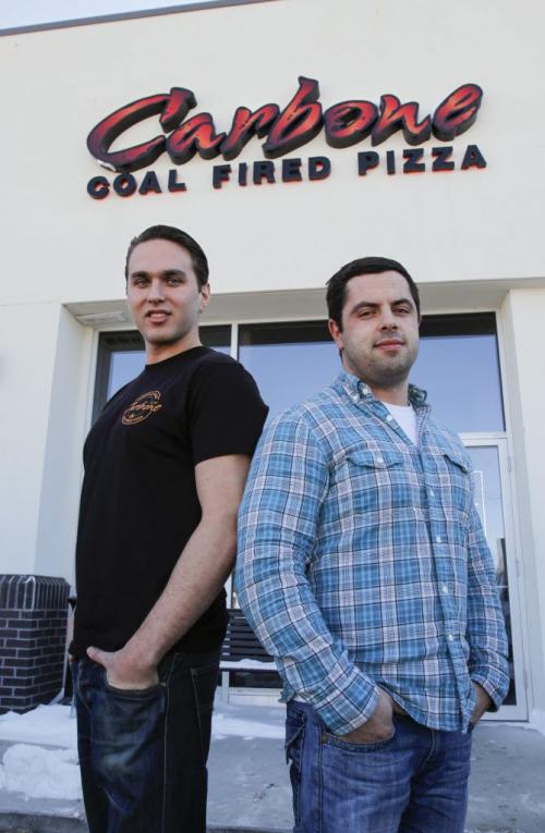 Carbone Coal-Fired Pizza co-owner-operators Daniel Simon and Benjamin Nasberg (right to left) anticipate opening a second Winnipeg location this coming September. The new location is at 260 St. Mary Ave. downtown. March 21, 2013. (REPORTER: MURRAY MCNEILL) (JESSICA BURTNICK/WINNIPEG FREE PRESS)