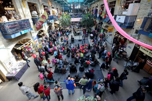 A large crowd in The Forks watching Mr.Mark perform during the Festival of Fools, Saturday, March 23, 2013. (TREVOR HAGAN/WINNIPEG FREE PRESS)