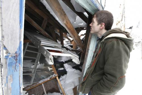 March 24, 2013 - 130324  -  David Reid of 667 Garwood surveys the damage to his garage after its roof caved in early Sunday, March 24, 2013. John Woods / Winnipeg Free Press