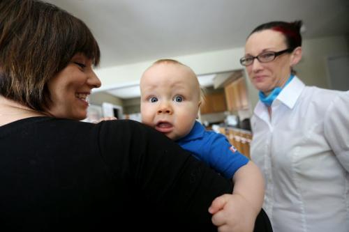 Felicia Wiltshire and her 9 month old son, Mason, with baby sleep consultant and parenting coach, Nichola Mitchell, Sunday, March 24, 2013. (TREVOR HAGAN/WINNIPEG FREE PRESS)