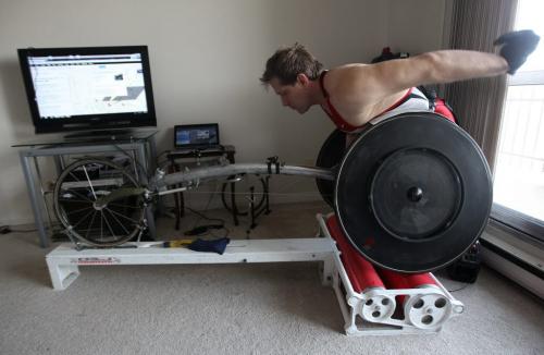 Colin Mathieson, a Paralympian wheelchair racer and  18 year member of Canadas nation track team trains at homeSee Ashley Prest story- March 25, 2013   (JOE BRYKSA / WINNIPEG FREE PRESS)