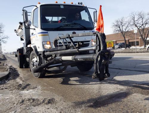 City crews ramp up pot hole repair efforts , 6 city Road Patchers and 5 hand-asphalting crews are currently working  are out on Priority One and Priority Two streets , call 311 or email at 311@winnipeg.ca. To report potholes Äì pic taken a newser on King Edward  at Logan Ave KEN GIGLIOTTI / Mar. 26 2013 / WINNIPEG FREE PRESS