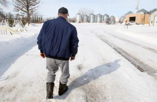 5 Miles south/west of Morris, Manitoba  Melvin Edel who has farmed 55 years 5 Miles south/west of Morris, Manitoba walks through his farm as he chats about his 15 flood he will fight  The Province of Manitoba released its latest flood forecast showing flooding in his area to be almost certain-See Flood story- March 26, 2013   (JOE BRYKSA / WINNIPEG FREE PRESS)