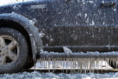 Ice ice baby- A SUV is covered in ice parked on Burrows Avestandup photo- March 27, 2013   (JOE BRYKSA / WINNIPEG FREE PRESS
