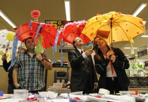 A slough of local media and personality types including CFL quarterback Buck Pearce, Virgin Radio's Adam West and the Winnipeg Free Press' very own columnist Doug Spiers took part in an umbrella decorating contest to kick off a joint fundraising campaign between Easter Seals, Special Olympics and Canada Safeway on Wednesday, March 27, 2013. The event was held at the Safeway located on River Ave. at Osborne St. (REPORTER: DOUG SPIERS) (JESSICA BURTNICK/WINNIPEG FREE PRESS)