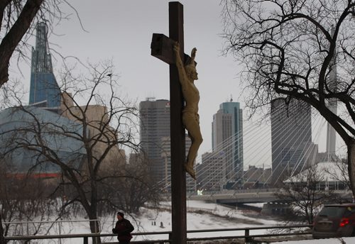 Stdup - Holy Week- In pic Crucifixion memorial at St. Boniface  Cathedral . The worlds 2.18 billion Christians (758,000 Manitobans)  are celebrating  Holy Week  with church services and  family meals ,  Holy Thursday commemorating the Last Supper  , Good Friday and Easter Sunday , the Jewish religion also celebrates Passover from March 25 Äì April 2 KEN GIGLIOTTI / Mar. 28 2013 / WINNIPEG FREE PRESS