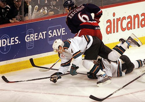 BORIS MINKEVICH / WINNIPEG FREE PRESS  070419 Manitoba Moose vs. Grand Rapids Griffins. Moose #14 Marc Chouinard goes for the puck.