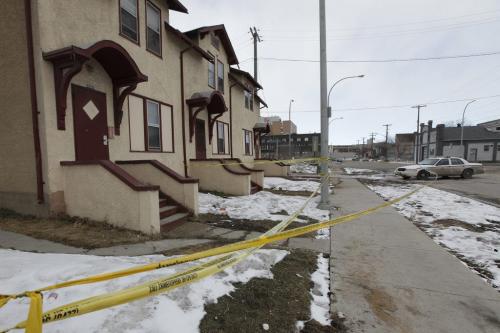 March 31, 2013 - 130303  -  Police guard the scene of a stabbing at Martha Street and Disraeli Freeway Sunday, March 31, 2013. John Woods / Winnipeg Free Press