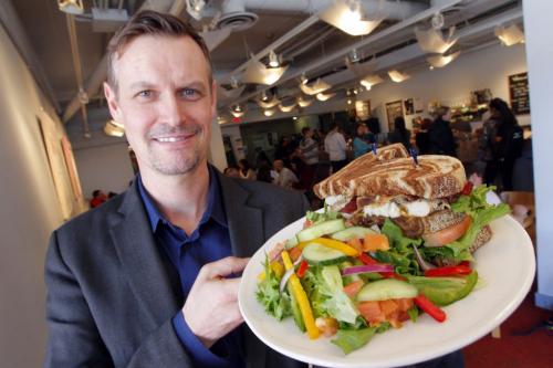 Degrees Restaurant - Club Sandwich story by Sanderson. Manager Thomas Blumer poses with the sandwich. April 1, 2013  BORIS MINKEVICH / WINNIPEG FREE PRESS