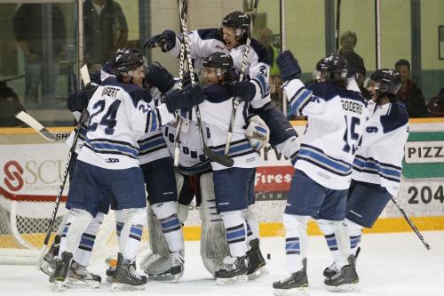 April 1, 2013 - 130401  -  Steinbach Pistons celebrate their defeat of the Winnipeg South Blues in game 6 of the series of the MJHL Addison Divisional Final Monday, April 1, 2013. Steinbach moves on to the MJHL final. John Woods / Winnipeg Free Press