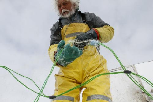 Fairford, Man. ice fisherman Frank Kenyon draws in one of about 45 gill nets he's set on Lake Manitoba to take in his catch. Tuesday, March 26, 2013. (REPORTER: BARTLEY KIVES) (JESSICA BURTNICK/WINNIPEG FREE PRESS)