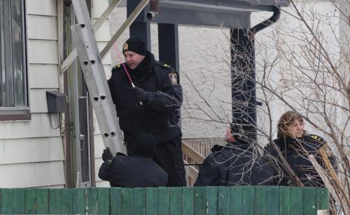 Winnipeg Police identification officers gather evidence from Tuesday afternoon homicide scene in the 500 block of Langside St Wednesday afternoon standup photo- April 03, 2013   (JOE BRYKSA / WINNIPEG FREE PRESS)