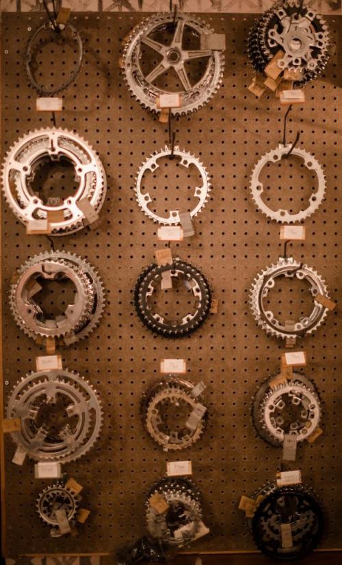 Used gear wheels on display at Natural Cycle in the Exchange District. 130403 - Wednesday, April 03, 2013 - (Melissa Tait / Winnipeg Free Press)