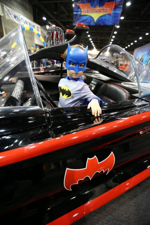 Seth Wray-Jantz, 4, sits behind the steering wheel in a version of the original Batmobile on display at the 39th annual World of Wheels show at the Winnipeg Convention Centre on Sat., April 6, 2013. The show continues Sunday. Photo by Jason Halstead/Winnipeg Free Press