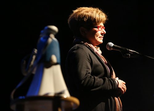 Judy Wasylycia-Leis speaks during a tribute to Nick Ternette's life at the West End Cultural Centre, Sunday, April 7, 2013. Nick's famous bullhorn was on the stage. (TREVOR HAGAN/WINNIPEG FREE PRESS)