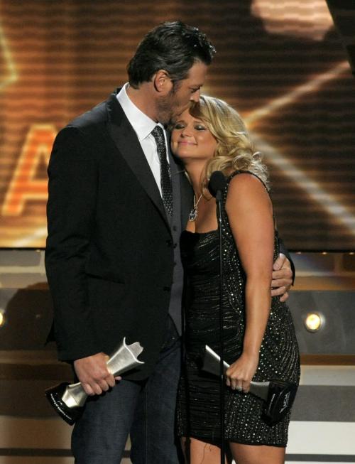 Miranda Lambert, right, and Blake Shelton accept the award for song of the year for "Over You" at the 48th Annual Academy of Country Music Awards at the MGM Grand Garden Arena in Las Vegas on Sunday, April 7, 2013. (Photo by Chris Pizzello/Invision/AP)