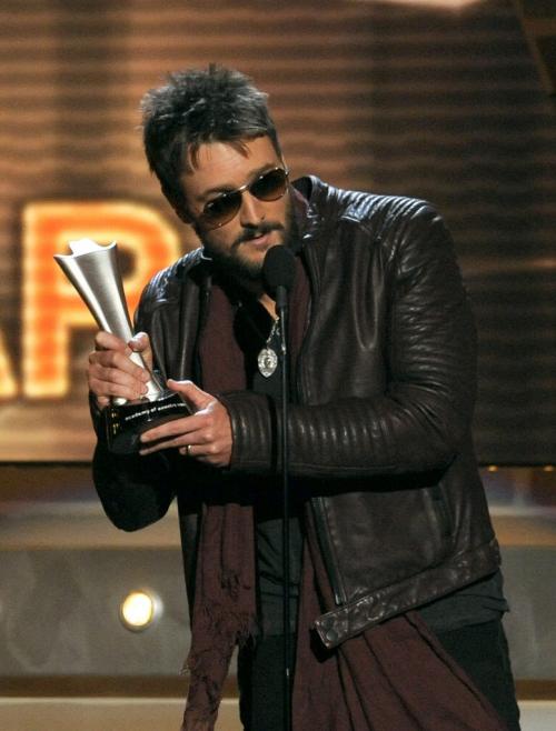 Eric Church accepts the award for album of the year for "Chief" at the 48th Annual Academy of Country Music Awards at the MGM Grand Garden Arena in Las Vegas on Sunday, April 7, 2013. (Photo by Chris Pizzello/Invision/AP)