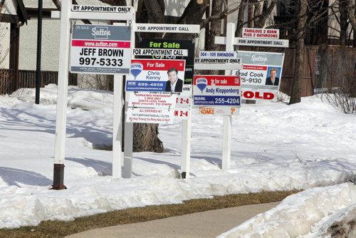 house/condo for sale signs on Taylor Ave west. April 8, 2013  BORIS MINKEVICH / WINNIPEG FREE PRESS