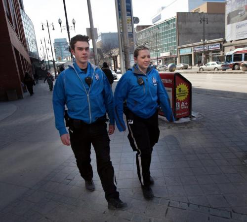 Police Service Cadets Erin Brolly and Daniel Popel (left) walk a downtown beat Monday afternoon. See Jenn Skerrit's story. April 8, 2013 - (Phil Hossack / Winnipeg Free Press)