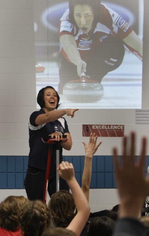 Curling Champion Jill Officer looks for volunteers during her presentation  who along with multiple Paralympic medalist for wheelchair rugby, Jared Funk gave an inspiring talk of their expriences to students at Starbuck School in Starbuck Manitoba Monday. The school got the honour to have the athletes attend because Larry McCrady of Morris won their guest appearance through a Pennies from Heaven draw and decided to have them attend a nearby elementary school his grandson attends so the kids in K to Gr. 8 could see them. They are part of the  RBC Olympians program who bring the Olympic messages of excellence and leadership to Canadian communities.(WAYNE GLOWACKI/WINNIPEG FREE PRESS) Winnipeg Free Press April 8 2013