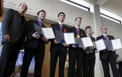 From left, Mayor Sam Katz presented members of Team Dunstone that won the gold medal at the 2013 Canadian Junior Mens Curling Championships they are Matt Dunstone, Skip , Colton Lott, Third, Daniel Grant, Second, Brendan MacCuish, Lead and Coach  Scott Grant with the City of Winnipegs Outstanding Achievement Award. The ceremony took place Tuesday at City Hall.   (WAYNE GLOWACKI/WINNIPEG FREE PRESS) Winnipeg Free Press April 9 2013