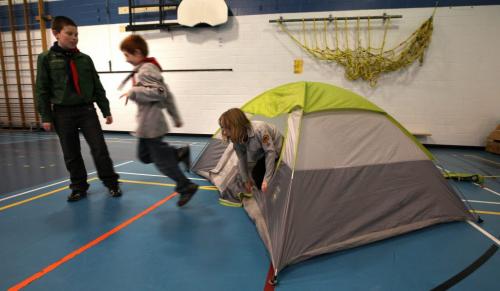 Good Deed Week Cub scouts bubble out of a tent they erecte4d under the direction of a Scout Wednesday evening. The troup is preparing for an early spring camping trip in a couple of weeeks. See Carolin Vesely's story. April 10, 2013 - (Phil Hossack / Winnipeg Free Press)