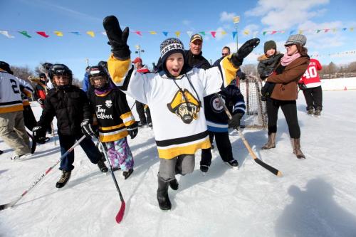 Ten year old Konrad Schaible cant wait to play more hockey on the outdoor ice rink at Roblin Park Community Club Saturday morning. The parks maker Marcy Beaucage, broke the record for the latest ever outdoor hockey rink in his lifetime of ice making Saturday when he iced the rink the night before and told members to come out for a game of "Shinny" Saturday. Photography Ruth Bonneville Ruth Bonneville /  Winnipeg Free Press)