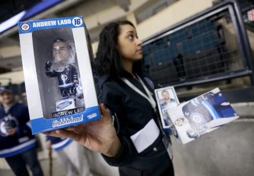 Some Winnipeg Jets' Andrew Ladd (16) bobble head dolls were given away during the teams special open practice at MTS Centre in Winnipeg in front of about 3000 fans, Sunday, April 14, 2013. (TREVOR HAGAN/WINNIPEG FREE PRESS)