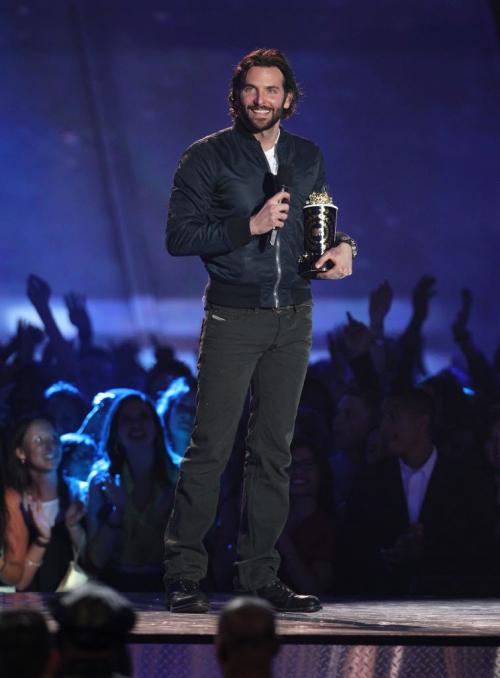 Bradley Cooper accepts the award for best male performance for "Silver Linings Playbook" at the MTV Movie Awards in Sony Pictures Studio Lot in Culver City, Calif., on Sunday April 14, 2013. (Photo by Matt Sayles/Invision /AP)
