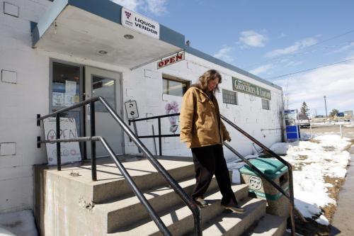 Ingrid Bauer leaves the town's  grocery story  she started a petion to save. Manitoba Hydro is building a new spillway  and the old company town in closing . People living in company housing have been given notice to leave .  Pointe du Bois 's  75mw plant  is  located on the Winnipeg River  160km NW of Winnipeg  ,generating 599million kWh  from a 14m drop built in 1909  at a cost of $3.5million. It was built with  16 turbine generators ,the first coming into service in 1911 opening .Bill Redekop story