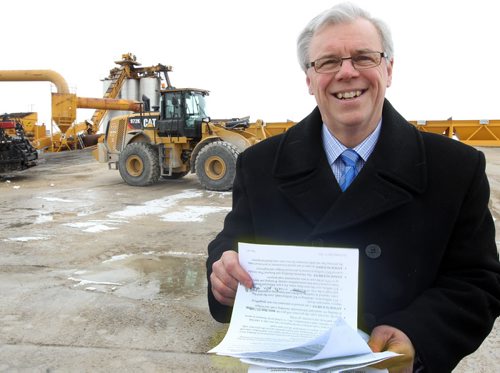 Premier Greg Selinger used an asphalt plant as a background today to pitch his infrastructure-spending plan from his latest budgetSee Bruce Owen story- April 17, 2013   (JOE BRYKSA / WINNIPEG FREE PRESS)