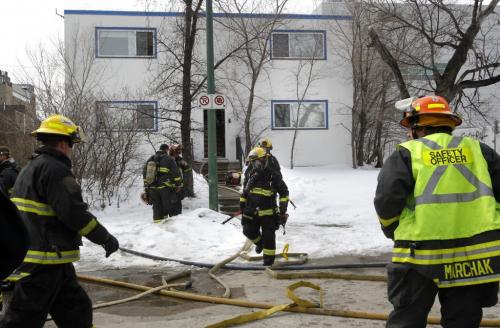 Winnipeg Fire Fighters at the scene of a fire in an apartment in a building in the 700 block of Elgin Ave. Wednesday. A resident said there were no injuries. Wayne Glowacki /Winnipeg Free Press April 17 2013