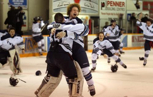 Steinbach Piston defenceman Taylor Friesen embraces netminder Corey Koop after the pistons produced a 6th game win to defeat the Dauphin Kings in Steinbach Wednesday. See Melissa Martin's story. April 17, 2013 - (Phil Hossack - Winnipeg Free Press)