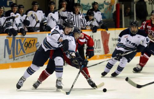 Steinbach Piston #9 Trent Genyk forces Dauphin Kings #14 Tommy Hrazdira out of the play Wednesday as the Pistons produced a 6th game win to defeat the Dauphin Kings in Steinbach Wednesday. See Melissa Marin's story. April 17, 2013 - (Phil Hossack - Winnipeg Free Press)