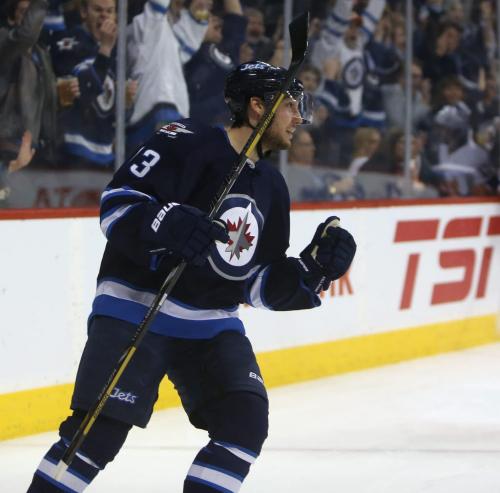 Winnipeg Jets' Kyle Wellwood (13) celebrates his second goal of the second period period NHL action against the New York Islanders' at MTS Centre in Winnipeg, Saturday, April 20, 2013. (TREVOR HAGAN/WINNIPEG FREE PRESS)