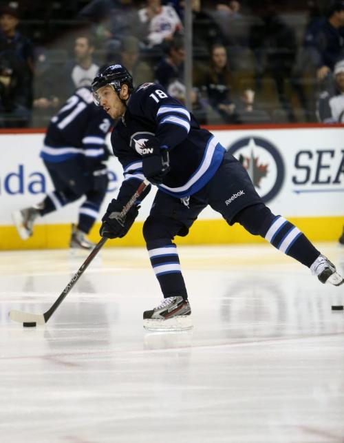 Winnipeg Jets' Bryan Little (18) during warmup prior to facing off against the Tampa Bay Lightnings' at MTS Centre in Winnipeg, Tuesday, April 16, 2013. (TREVOR HAGAN/WINNIPEG FREE PRESS)