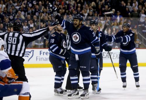 Winnipeg Jets' Dustin Byfuglien (33) reacts to a disallowed goal after time expired at the end of the second period of NHL action against the New York Islanders' at MTS Centre in Winnipeg, Saturday, April 20, 2013. (TREVOR HAGAN/WINNIPEG FREE PRESS)