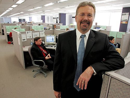 BORIS MINKEVICH / WINNIPEG FREE PRESS  070424 Russ Kalchik from The Faneuil Group poses for a photo in the Winnipeg office.