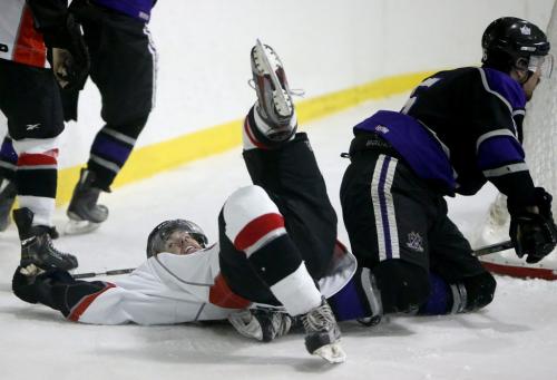 Richmond Sockeyes' Stephen Campbell collides with Saskatoon Royals' Hayden Cameron during the Keystone Cup gold medal game in St.Malo, Sunday, April 21, 2013. The Keystone Cup is the Western Canada Junior B Hockey Championship. (TREVOR HAGAN/WINNIPEG FREE PRESS)