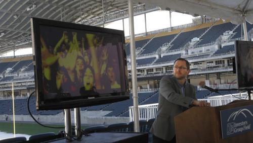 Senior Vice President, True North Sports & Entertainment, Kevin Donnelly watches  Paul McCartney video shown In lnvestors Group Field Monday at the announcement McCartney will be here on Aug.12. Wayne Glowacki/Winnipeg Free Press April 12 2013 Geoff Kirbyson story(WAYNE GLOWACKI/WINNIPEG FREE PRESS) Winnipeg Free Press April 22  2013