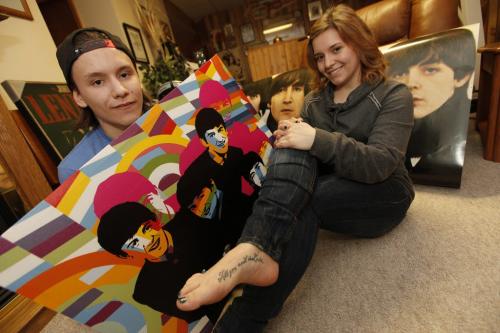 April 22, 2013 - 130422  -  Victoria Ploszay and her brother Paul are photographed with some of their Beatles paraphrenalia in their home Monday, April 22, 2013. John Woods / Winnipeg Free Press