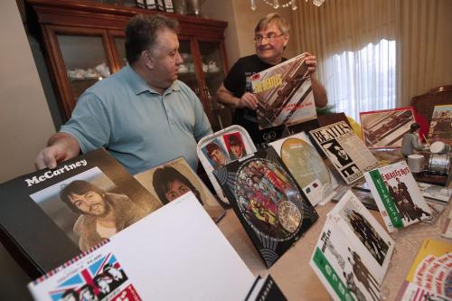 April 22, 2013 - 130422  -  Richard Sturtz (R) and his brother-in-law Alex Reid are photographed with some of their Beatles paraphrenalia in their home Monday, April 22, 2013. John Woods / Winnipeg Free Press