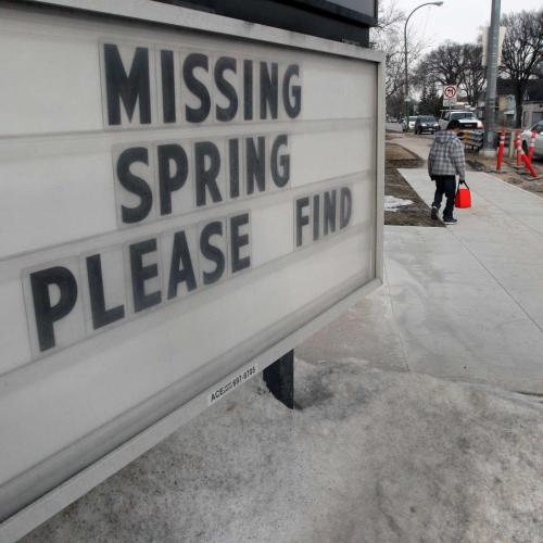 The sign outside the Voyage Funeral home on Henderson  and Hespler Ave says it all- Warm weather seekers can keep their fingers crossed as the weatherman predicts a high this Sunday of 18C - Standup photo-April 24, 2013   (JOE BRYKSA / WINNIPEG FREE PRESS)
