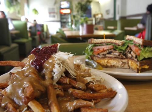 Restaurant review - Osborne Village Cafe. The  Turkey Poutine and Club Mansion. Marion Warhaft story(WAYNE GLOWACKI/WINNIPEG FREE PRESS) Winnipeg Free Press April 24 2013