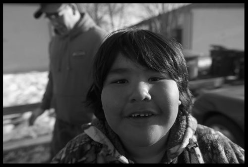 Brandon Sun A Neighbourhood Comes Together -- From a simple flyer posted by four Police Studies students from Assiniboine Community College, more than 20 children and adults from the Cornell Bay area pitched in to do their part in a neighbourhood clean-up on Tuesday evening. (Bruce Bumstead/Brandon Sun)
