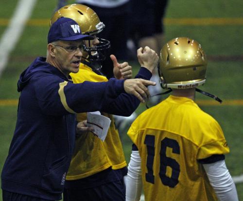 Stdup - Blue Bomber Mini Camp feature on Gary Crowton Offensive CO talking to QB's #14 Chase Clement  and #16 Max Hall -  at  Wpg Indoor Soccer Complex at UofM . KEN GIGLIOTTI / April . 26 2013 / WINNIPEG FREE PRESS
